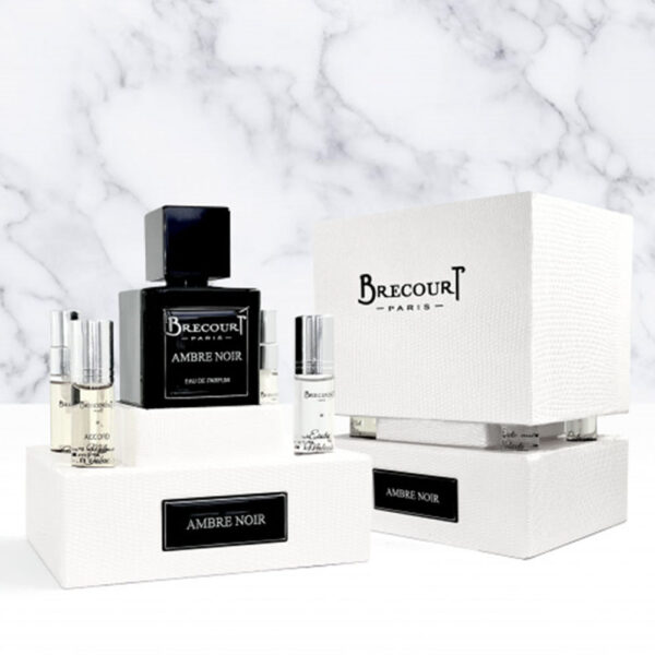 brecourt-paris-ambre-noir-displayed-with-amber-resins-vanilla-pods-and-myrrh-elegant-scent-in-nigeria-also-displays-a-pack