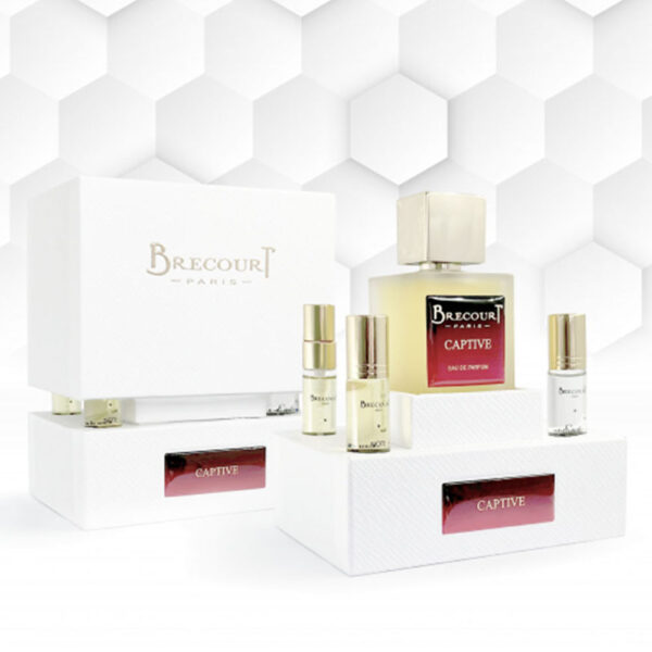brecourt-paris-captive-perfume-bottle-placed-on-satin-with-jasmine-and-almond-petals-sensual-white-floral-for-nigeria
